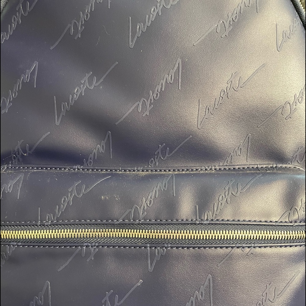 Lacoste Backpack - soft but sturdy PVC backpack in Navy / Green interior lining